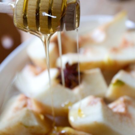 Quince baked with Honey and Star Anise - honey drizzled over