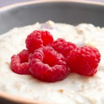 cardamom infused porridge with raspberries