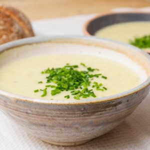 leek and potato soup topped with chives