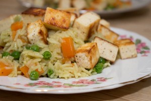 Pilaf with peas, carrots and paneer