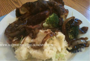 toad in the hole, onion gravy, mashed potatoes and broccoli