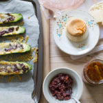 Olive and Fontina Baked Courgettes close up with antipasti