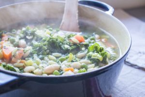 stirring the vegetable minestrone