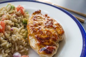 sticky chilli chicken with avocado rice salad