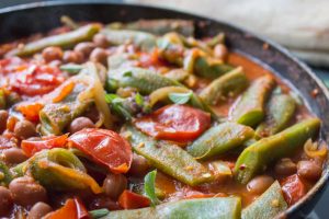 close up of runner bean and tomato stew