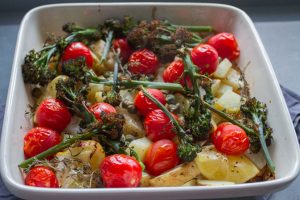 Potatoes, purple sprouting broccoli and potatoes in spring tray bake