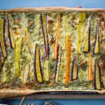 Rainbow carrot tart with summer herbs and goat's cheese